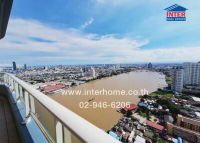 High-rise building offering panoramic city and river view