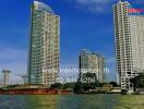 Exterior view of high-rise residential buildings near a river