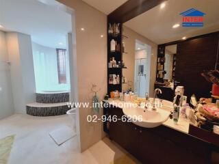 Modern bathroom with amenities and a bathtub