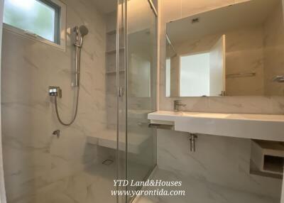 Modern bathroom with shower and glass enclosure