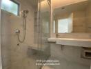 Modern bathroom with shower and glass enclosure