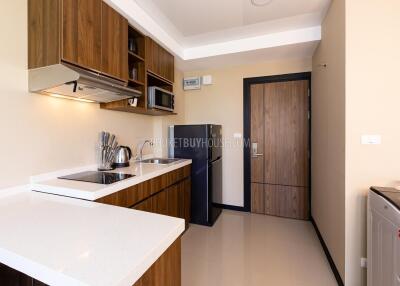 NAI22172: Luxurious 1-Bedroom Apartment for Sale in Nai Harn