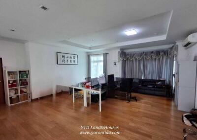 Living room with furniture and desk area