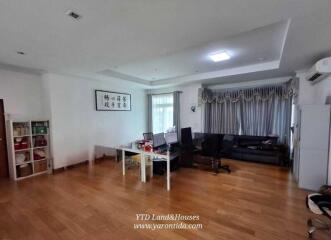 Living room with furniture and desk area