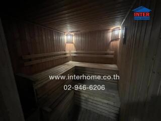 Wooden sauna with benches and wall lights