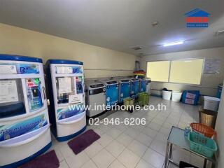 Laundry room with multiple washing machines and reverse osmosis machines