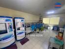 Laundry room with multiple washing machines and reverse osmosis machines