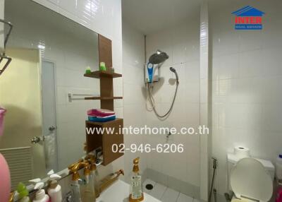 Bathroom with shower and sink