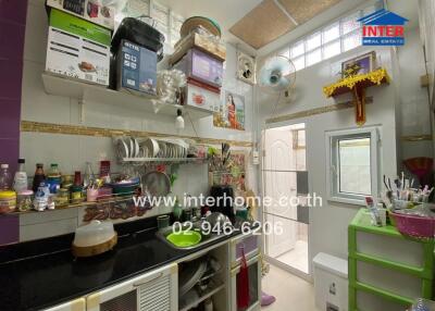 Well-organized kitchen with various storage solutions