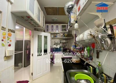 Compact kitchen with ample storage and modern appliances