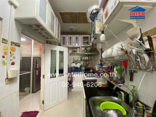 Compact kitchen with ample storage and modern appliances