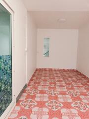 Empty room with tiled floor