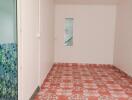 Empty room with tiled floor