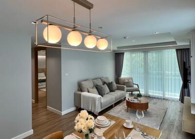 Modern living room with dining table and sofa