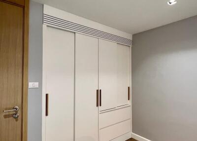 Modern bedroom with built-in wardrobe