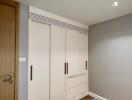 Modern bedroom with built-in wardrobe