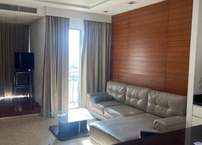 Living room with modern furniture and large windows