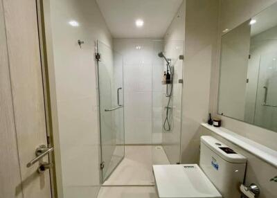 Modern bathroom with glass shower enclosure