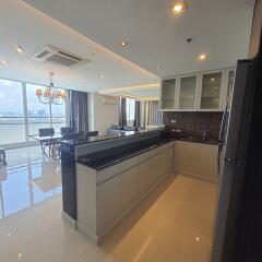 Modern kitchen with spacious dining and living area