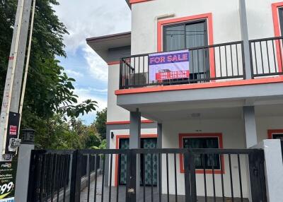 Two-story house with balcony and 