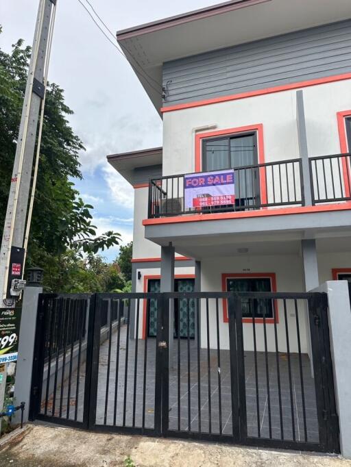 Two-story house with balcony and 