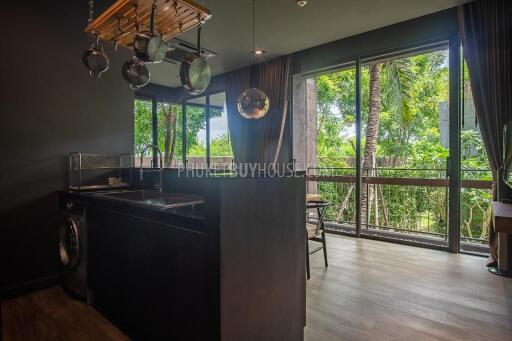 RAW6993: Corner Apartment with Garden Access in Nai Harn