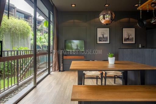 RAW6993: Corner Apartment with Garden Access in Nai Harn