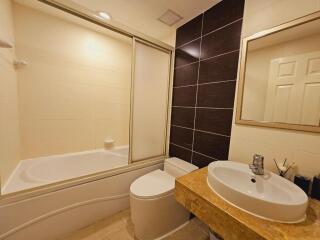 Modern bathroom with bathtub and vanity