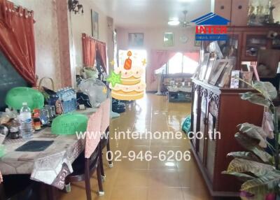 Broad view of the main living space showcasing dining area and living room