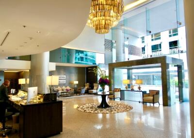 Luxury apartment lobby with modern furnishings and decor