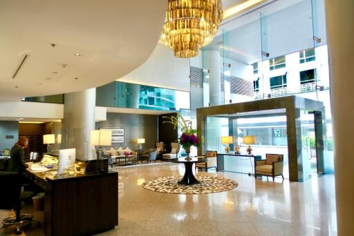 Luxury apartment lobby with modern furnishings and decor