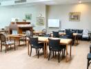 Spacious dining area with tables and chairs