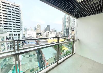 High-rise apartment balcony with a city view