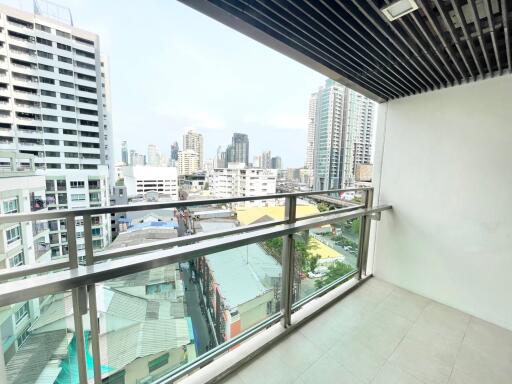 High-rise apartment balcony with a city view