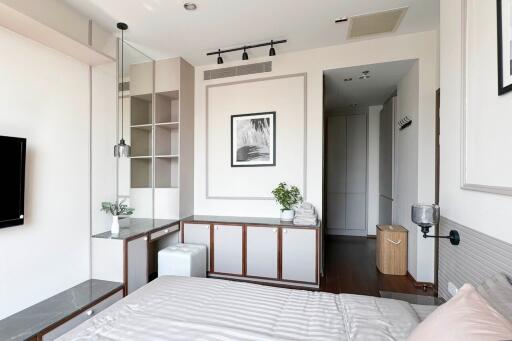 Modern bedroom with built-in storage and minimalist decor