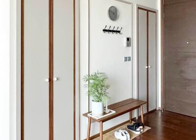 Well-organized entryway with storage cabinets