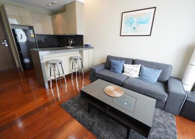 Modern living room with kitchen