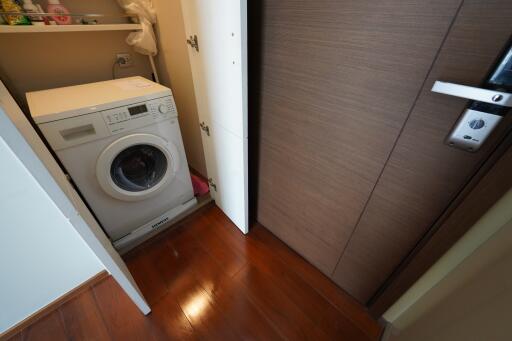 Compact laundry area with a washing machine