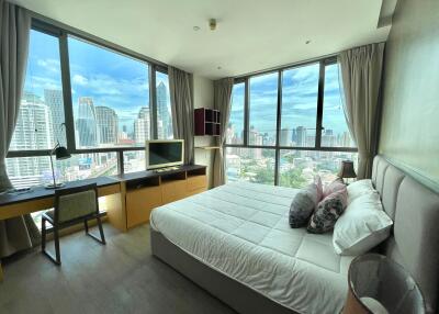 Modern bedroom with a city view