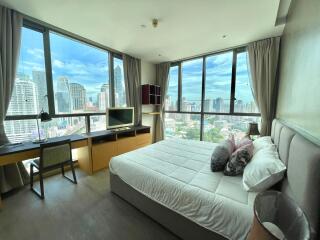 Modern bedroom with a city view