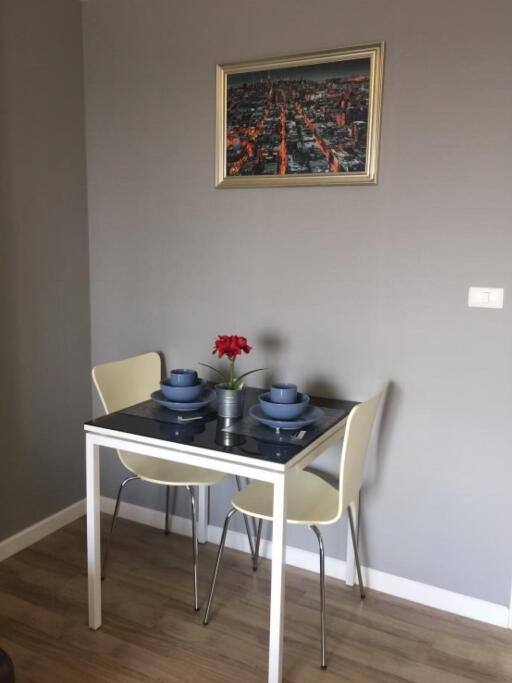 Small dining area with a table set for two