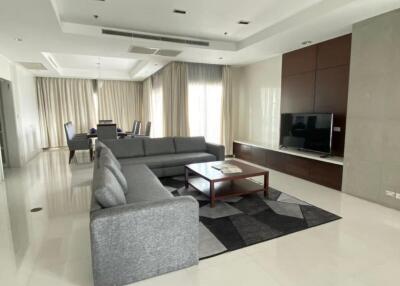 Spacious modern living room with dining area