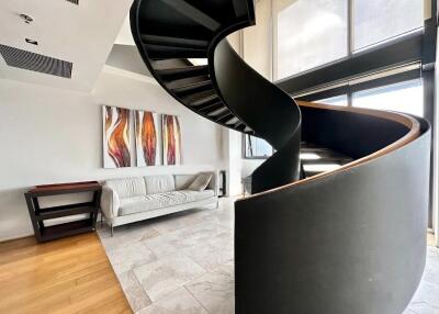 Modern living room with spiral staircase