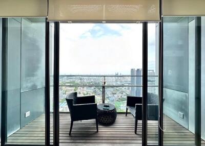 Balcony with seating overlooking cityscape