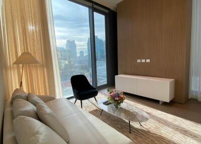 Modern living room with large windows and city view