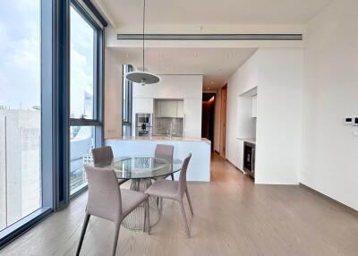 Modern kitchen and dining area with large windows