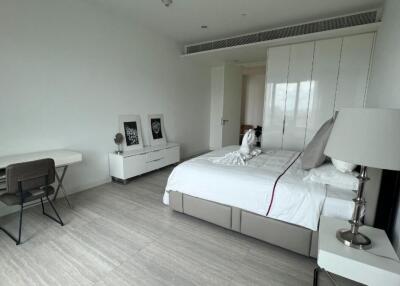 Modern bedroom with desk and double bed