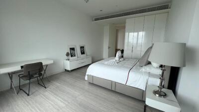 Modern bedroom with desk and double bed