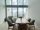 Modern dining room with large windows and city view