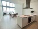 Modern kitchen and dining area with large windows